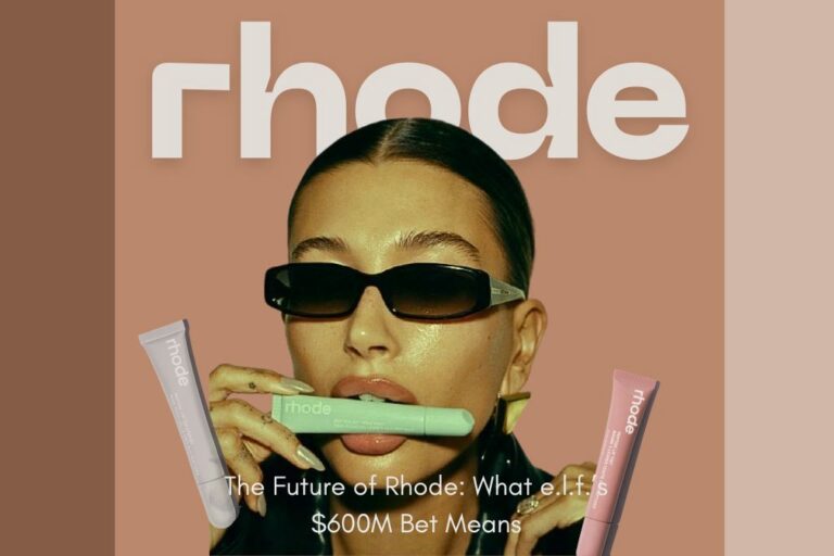 Hailey Bieber wearing sunglasses, posing with three Rhode skincare products, under a large 'rhode' logo and headline 'The Future of Rhode: What e.l.f.'s $600M Bet Means', referencing the Rhode x e.l.f Beauty partnership.